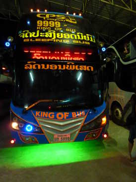 Photograph of our bright coloured bus in Vientiane